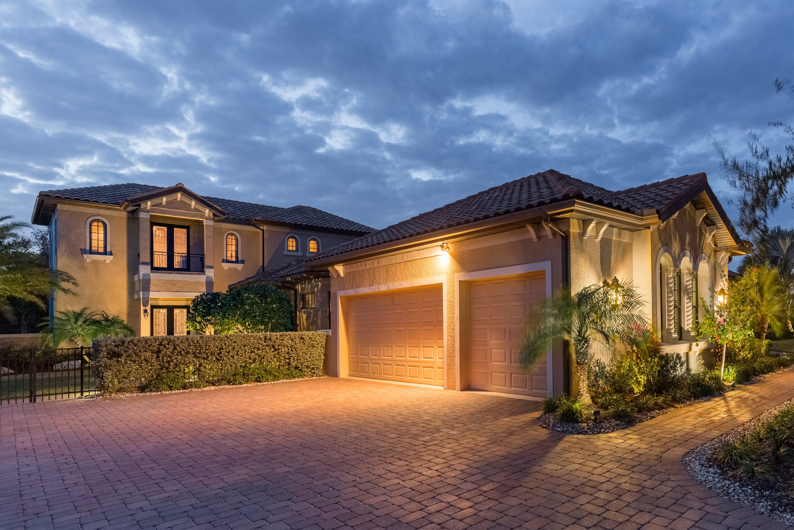An exterior view of a house at twilight.